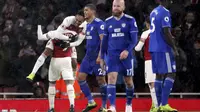 Striker Arsenal, Pierre-Emerick Aubameyang, merayakan gol ke gawang Cardiff City pada laga Premier League di Stadion Emirates, Rabu (30/1). Arsenal menang 2-1 atas Cardiff City. (AP/Nick Potts)