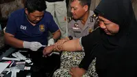  3 Kakak Kandung Yuli Korban MH17 asal Solo Diambil Sampel Darah
