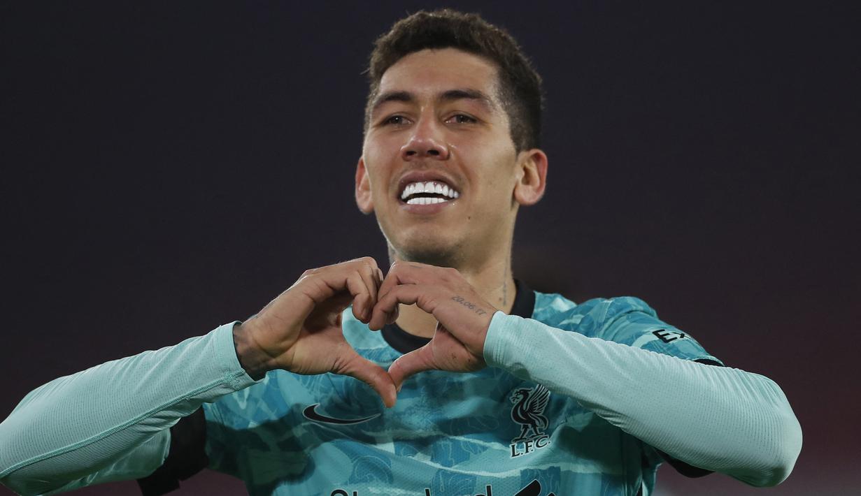 Roberto Firmino. Gelandang asal Brasil ini didatangkan Liverpool pada awal musim 2015/2016 dari Hoffenheim dengan nilai transfer 29 juta Poundsterling, lebih besar dari penawaran Manchester United kepada Hoffenheim meski lebih dulu bernegosiasi. (AFP/Lee Smith/Pool)