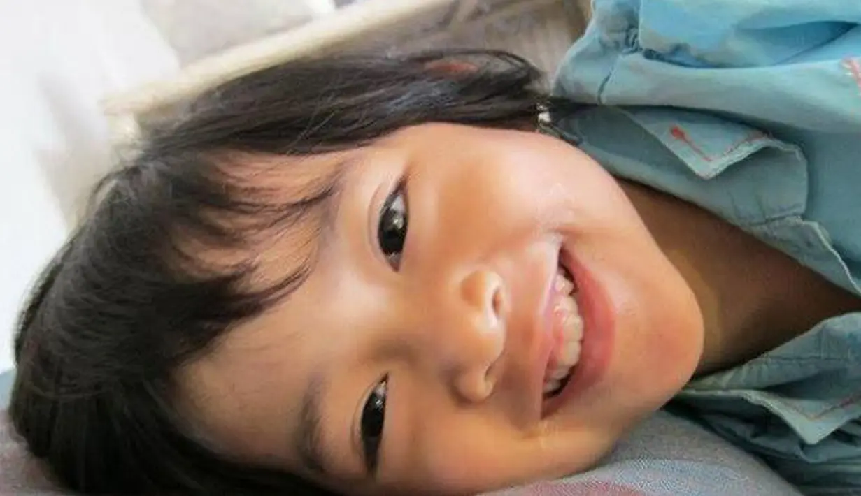 Senyum Angeline saat balita begitu menggemaskan. (Facebook/Find Angeline - Bali's Missing Child)