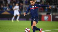 Striker Timnas Prancis, Antoine Griezmann, dalam pertandingan Kualifikasi Piala Dunia 2022 zona Eropa menghadapi Bosnia, Kamis (2/9/2021) dini hari WIB. Griezmann berhasil menyelamatkan timnya dari kekalahan lewat gol yang membuat kedudukan imbang 1-1 (FRANCK FIFE / AFP)