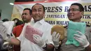 Dirtipid Narkoba Bareskrim Polri memperlihatkan barang bukti saat Press Release pengungkapan jaringan narkotika internasional, Jakarta, Selasa (7/3). Petugas mengamankan barang bukti 48 kg sabu dan 70.000 butir pil ekstasi. (Liputan6.com/Yoppy Renato)