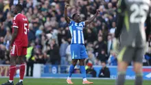 Danny Welbeck dari Brighton merayakan golnya setelah mencetak gol dalam pertandingan Liga Inggris antara Brighton dan Liverpool di Brighton, Sabtu, 21 Maret 2026. (AP Photo/Ian Walton)