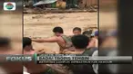 Sebanyak 75 orang di Filipina tewas akibat diterjang Badai Tropis 'Tembin', evakuasi warga dari arus deras berjalan dramatis.