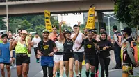 Sejumlah pelari terlihat mengikuti latihan rutin Road to Maybank Marathon 2024 di kawasan CFD Sudirman, Jakarta, Minggu lalu (14/7/2024)/Ist.