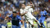 Gareth Bale (kanan) saat beraksi untuk Real Madrid lawan Getafe (AP Photo/Andrea Comas)