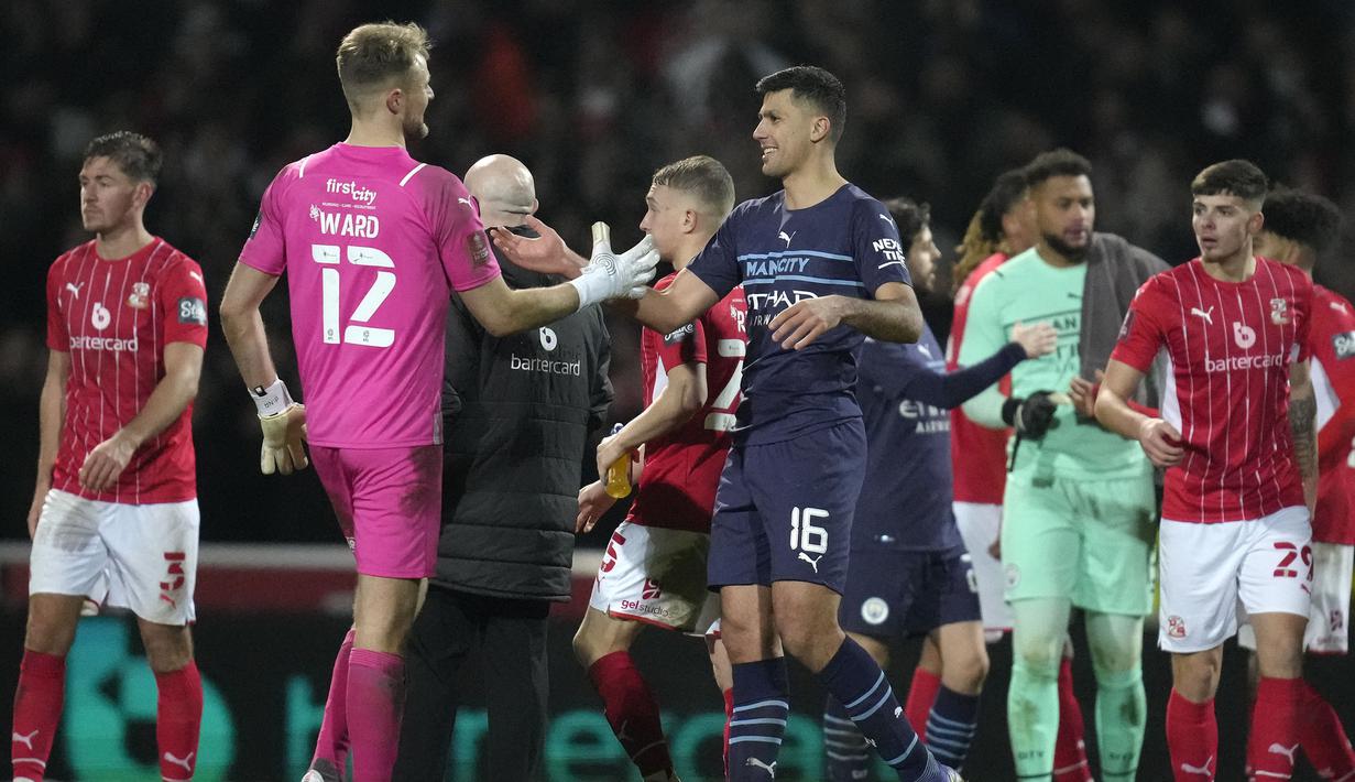 Tak puas disitu, Manchester City lagi-lagi mampu membuat gol di menit-menit akhir babak kedua lewat Cole Palmer. Menang 4-1 membuat The Cityzens melaju ke putaran berikutnya Piala FA 2021/2022. (AFP/