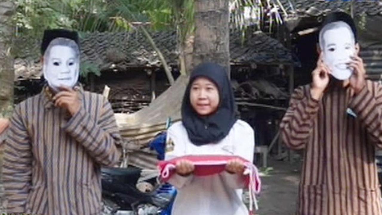 PENGIBAR BENDERA PRABOWO-JOKOWI - Liputan6 Pagi