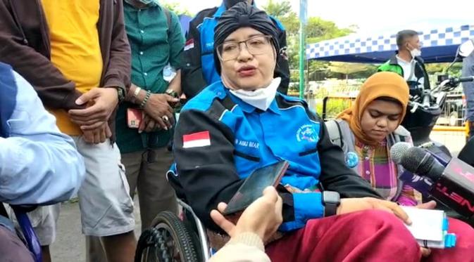 Kebahagiaan Difabel dapat Tiket Gratis Formula E (Liputan6.com/Ady Anugrahadi)