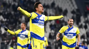 Pemain Juventus Paulo Dybala melakukan selebrasi usai mencetak gol ke gawang Sampdoria pada pertandingan sepak bola babak 16 besar Coppa Italia di Allianz Stadium, Turin, Italia, 18 Januari 2022. Juventus menang 4-1. (Marco Alpozzi/LaPresse via AP)