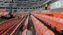 Tampilan bagian dalam Jakarta International Stadium (JIS), Selasa (21/12/2021). Pembangunan stadion yang dirancang sesuai standar Federation Internationale de Football Association (FIFA) ini rencananya mampu menampung hingga 82.000 penonton. (Liputan6.com/Helmi Fithriansyah)