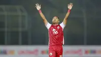 Gelandang Persija Jakarta, Tony Sucipto, merayakan kemenangan atas Barito Putera pada laga perempat final Piala Menpora 2021 di Stadion Kanjuruhan, Sabtu (10/4/2021). Persija menang dengan skor 1-0. (Bola.com/Arief Bagus)