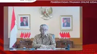 Ketua DK OJK Wimboh Santoso dalam penandatanganan Pernyataan Bersama dalam rangka Pemberantasan Pinjaman Online Ilegal.