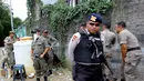  Sekitar 300 pasukan gabungan dari TNI, Brimob, Polri, dan Satpol PP melakukan pembongkaran 60 bangunan liar guna menanggulangi banjir, Jakarta, Rabu (7/5/2014) (Liputan6.com/Johan Tallo).