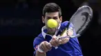 Petenis Serbia Novak Djokovic mengembalikan bola ke arah Petenis Brazil Thomaz Bellucci pada ronde kedua tenis ATP World Tour Masters 1000 indoor tenis tournament di Paris, Selasa (3/11/2015). (AFP PHOTO / Miguel Medina)