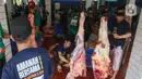 Untuk mencegah kerumunan dan memastikan distribusi yang lebih efektif, pembagian daging hewan kurban akan disalurkan langsung ke berbagai yayasan. (Liputan6.com/Angga Yuniar)