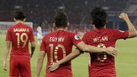 Gelandang Indonesia, Witan Sulaeman, melakukan selebrasi usai membobol gawang Uni Emirat Arab (UEA) pada laga AFC di SUGBK, Jakarta, Rabu (24/10/2018). Indonesia menang 1-0 atas UEA. (Bola.com/M Iqbal Ichsan)