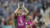Cristiano Ronaldo merayakan kemenangan Portugal atas Uruguay pada pertandingan Grup H Piala Dunia 2022 di Stadion Lusail, Qatar,&nbsp;Selasa, 29 November 2022. (AP Photo/ Aijaz Rahi)