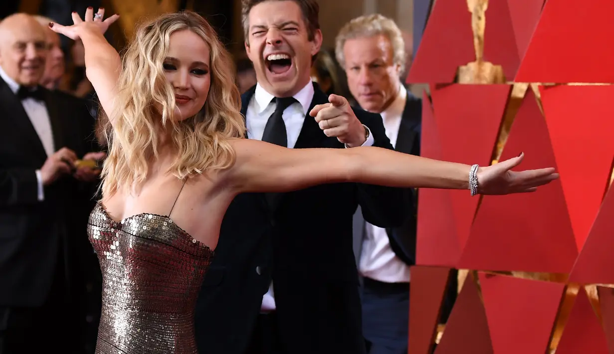 Dilansir dari E!, JLaw mengaku aktif di sosial media namun hanya sebagai penonton. (ANGELA WEISS  AFP)