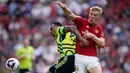 Berlaga di kandang sendiri, The Red Devils tampil ngotot dan menyerang. (AP Photo/Dave Thompson)