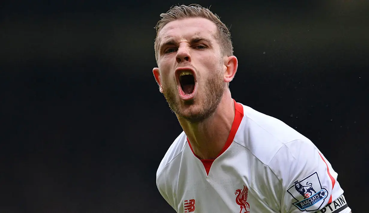 9. Ekspresi kegembiaran dari gelandang Liverpool, Jordan Henderson, usai timnya mengalahkan Crystal Palace pada laga Liga Premier Inggris di Stadion Selhurst Park, Minggu (6/3/2016). Crystal Palace takluk 1-2 dari Liverpool. (AFP/Glyn Kirk)