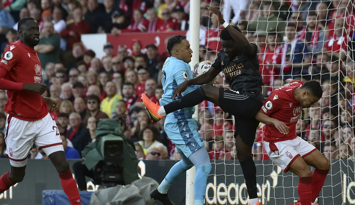 <p>Manchester City sukses memastikan diri menjadi juara Liga Inggris 2022/2023 tanpa perlu turun bertanding. The Citizens tak lagi terkejar usai rivalnya Arsenal secara mengejutkan kalah dari Nottingham Forest. (AP Photo/Rui Vieira)</p>