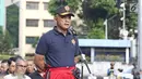 Waasintel Panglima TNI Brigjen TNI (MAR) R Widad Prasojo memberikan sambutan saat pelepasan kirab estafet International Veteran Cycling Association (IVCA) 2018 di Museum Polri, Jakarta, Minggu (25/3). (Liputan6.com/Herman Zakharia)