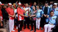 pawai obor Asian Para Games 2018 diawali dari Kota Solo, Rabu (5/9/2018). (Bola.com/Ronald Seger Prabowo)