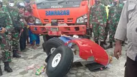 Puing-puing berupa roda pesawat MAF type Kodiak PK-MC K-100 jatuh dan tenggelam di Danau Sentani, Kabupaten Jayapura. (Liputan6.com/SAR Jayapura/Katharina Janur)