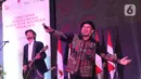 Vokalis Padi Reborn, Fadly dan Gitaris Piyu saat memeriahkan penutupan perdagangan bursa efek Indonesia tahun 2019 di BEI, Jakarta, Senin (30/12/2019). Padi Reborn menghibur para tamu undangan dalam penutupan perdagangan tersebut. (Liputan6.com/Angga Yuniar)