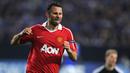 Ryan Giggs menjadi pemain tertua yang pernah mencetak gol di Manchester United. Giggs melakukannya di usia 39 tahun 2 bulan 50 hari saat menghadapi Queen Park Rangers di Liga Inggris 2012/2013. (AFP/Patrik Stollarz)