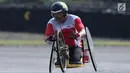 Atlet ParaCycling, Soemantri saat laga di nomor Mens H4-5 Individual Time Trial Road Race Asian Para Games 2018 di Sirkuit Sentul, Bogor, Senin (8/10). Soemantriberhasil merebut medali perunggu. (Liputan6.com/Helmi Fithriansyah)