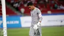 Penjaga gawang timnas Indonesia U-23, Teguh Amriruddin tertunduk usai gawangnya dijebol pemain Thailand di semifinal sepak bola SEA Games ke-28 di National Stadium Singapore, Sabtu (13/6/2015). Indonesia kalah 0-5. (Liputan6.com/Helmi Fithriansyah)