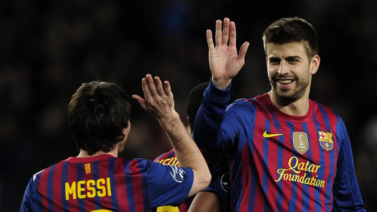 Lionel Messi dan Gerard Pique