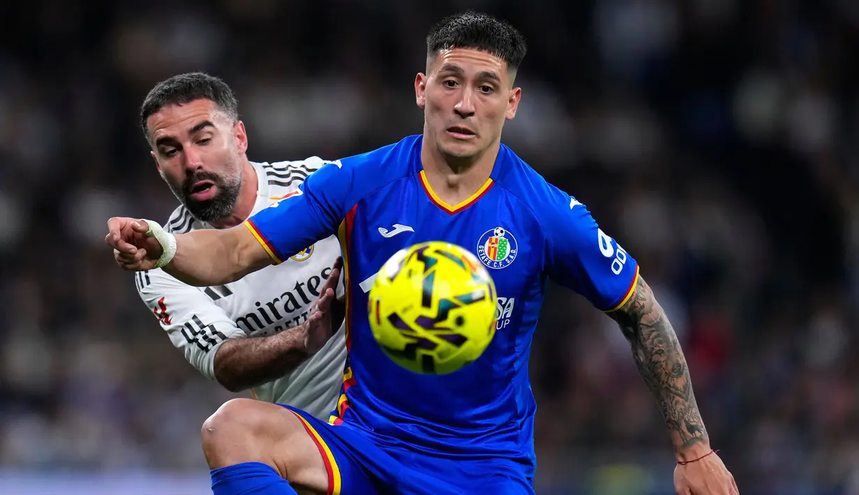 Bermain di kandang sendiri, Los Blancos mampu tampil dominan dan menguasai jalannya pertandingan. (AP Photo/Manu Fernandez)