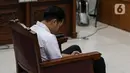 Terdakwa Richard Eliezer Pudihang Lumiu menjalani sidang lanjutan dalam kasus pembunuhan Brigadir Yosua Hutabarat di Pengadilan Negeri Jakarta Selatan, Rabu (18/1/2023).  Richard Eliezer didakwa bersama tiga orang lain, yakni Ferdy Sambo, Ricky Rizal, dan Kuat Ma’ruf dengan Pasal 340 KUHP jo Pasal 55 ayat (1) ke-1 KUHP subsider Pasal 338 KUHP jo Pasal 55 ayat (1) ke-1 KUHP. (Liputan6.com/Johan Tallo)