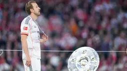 Harry Kane selama ini kerap disandingkan dengan statistik mengesankan namun tanpa satupun trofi. (AP Photo/Matthias Schrader)