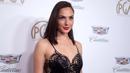 Aktris Gal Gadot menggenakan gaun hitam saat tiba menghadiri Producers Guild Awards ke-29 di Beverly Hilton di Beverly Hills, California (20/1). (Photo by Richard Shotwell/Invision/AP)
