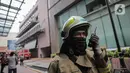Suasana Gedung Kementerian Hukum dan Hak Asasi Manusia Republik Indonesia (Kemenkumham) seusai peristiwa kebakaran di Jalan Rasuna Said, Kuningan Jaksel, Kamis (8/12/2022). Gedung yang terbakar di area perkantoran Kemenkumham yakni lantai 5 Gedung Sentra Mulia.. (Liputan6.com/Faizal Fanani)