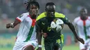 Senegal sukses melangkah ke final Piala Afrika 2021 usai mengalahkan Burkina Faso di Ahmadou Ahidjo Stadium, Yaounde, Kamis (3/2/2022) dini hari WIB. Penyerang Liverpool, Sadio Mane jadi aktor penting usai tampil gemilang pada laga tersebut. (AFP/Kenzo Tribouillard)