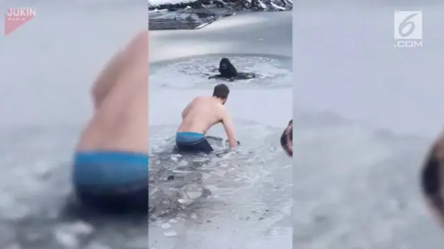 Seorang pria rela melompat ke kolam beku demi menyelamatkan seekor anjing.