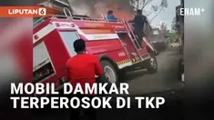 Gerak cepat pemadam kebakaran di Sidrap, Pangkajene, Sulawesi Selatan berujung apes. Mobil damkar terperosok hingga miring saat mencapai TKP. Fokus warga seketika bergeser untuk menolong mobil tersebut.