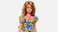 Sosok Barbie yang menggambarkan penyandang down syndrome (Tangkapan layar dari website cnn.com)