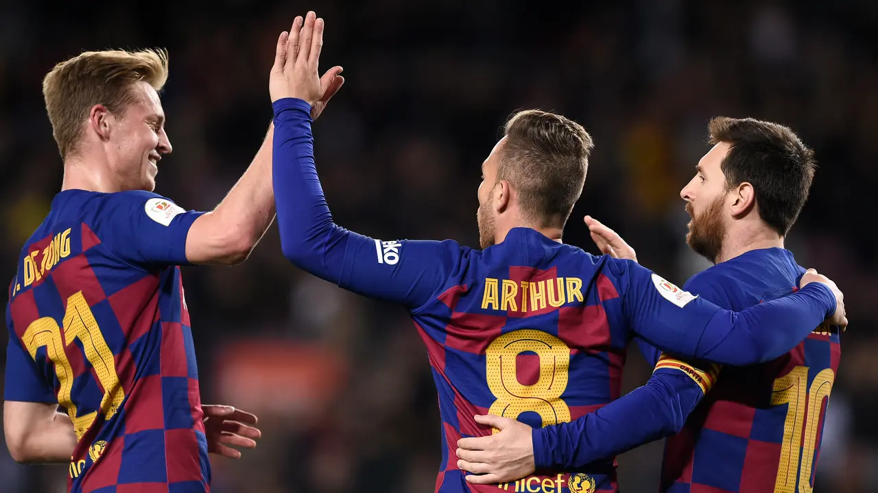 Frenkie de Jong dan Lionel Messi