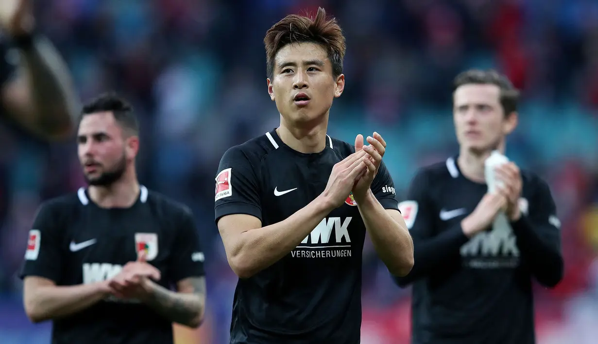 Koo Ja-Cheol tercatat pernah berkarier di Liga Jerman selama delapan setengah tahun. Koo pernah membela tiga klub Bundesliga yaitu VfL Wolfsburg, Mainz 05, dan Augsburg. Saat ini dirinya bermain di Liga Qatar bersama Al-Khor FC. (AFP/Ronny Hartmann)