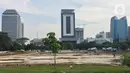 Suasana pembangunan proyek revitalisasi Taman Monumen Nasional (Monas) di Jakarta, Sabtu (18/1/2020). Sejumlah fasilitas publik akan dibangun di Taman Monas, mulai dari lokasi upacara dan parade. (Liputan6.com/Immanuel Antonius)