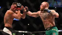 Menang Angka, McGregor Berhasil Balas Dendam kepada Diaz