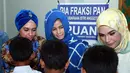 Jihan Fahira saat hadir dalam acara bakti sosial yang diadakan oleh Persaudaraan istri Anggota partai PAN DPR RI di Kawasan Kalibata, Kamis (16/6/2016). (Deki Prayoga/Bintang.com)
