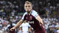 Jarrod Bowen merupakan pemain yang cocok dengan skema permainan pressing tinggi yang diterapkan oleh Jurgen Klopp. Menurut Whoscores, ia mencatatkan 1,6 tekel dan 1,2 intersep per pertandingan. Pemain West Ham tersebut juga memiliki kemampuan bermain di banyak posisi. (AFP/Oli Scarff)