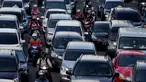 Kendaraan bermotor melintas di persimpangan Jalan Medan Merdeka Timur, Jakarta, Rabu (14/1/2015). (Liputan6.com/Faizal Fanani)